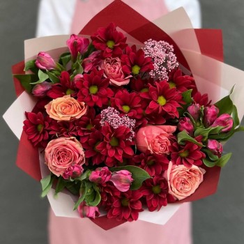 Author's bouquet of red spray Chrysanthemums and coral Roses