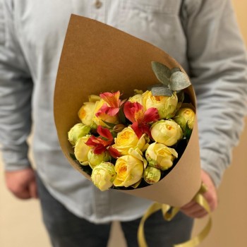 Author's bouquet of peony roses in craft packaging